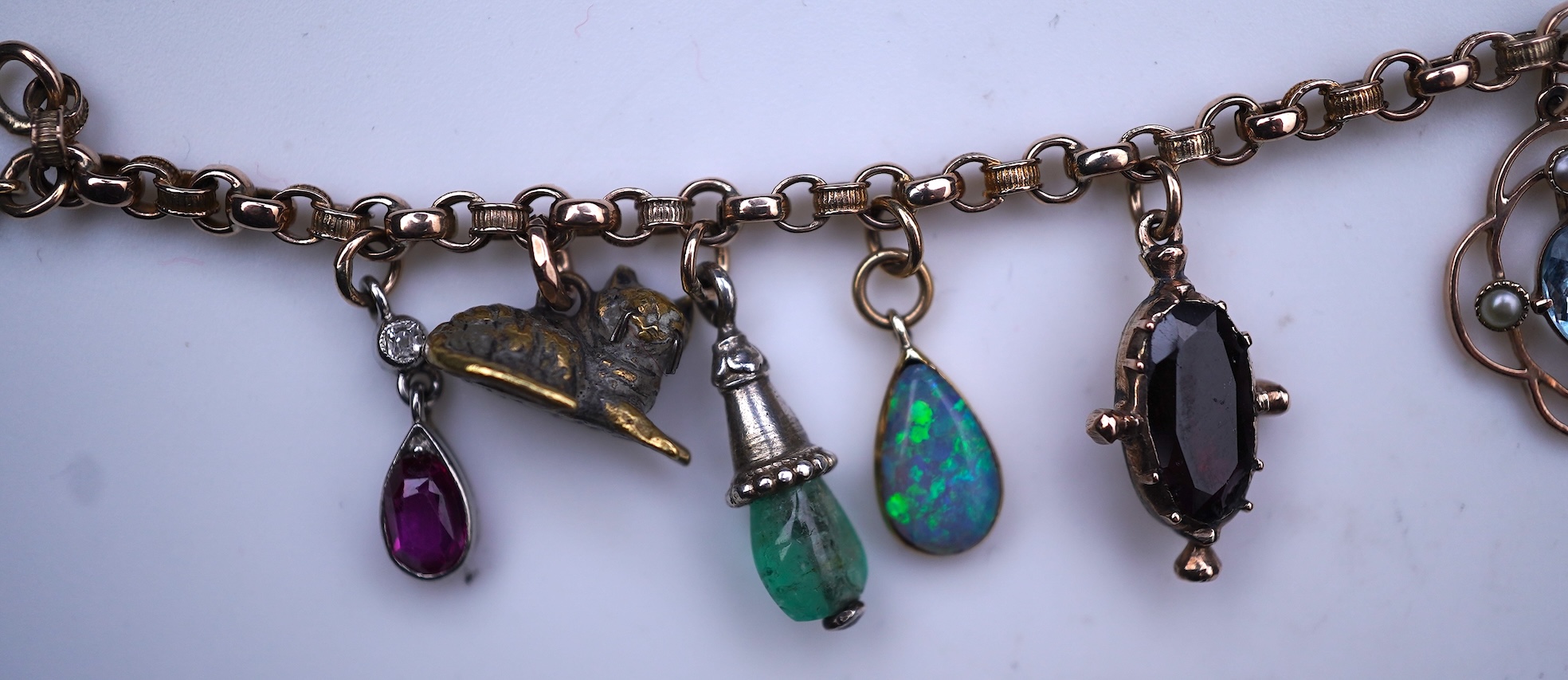 A gem-set charm bracelet, late 19th-early 20th century
